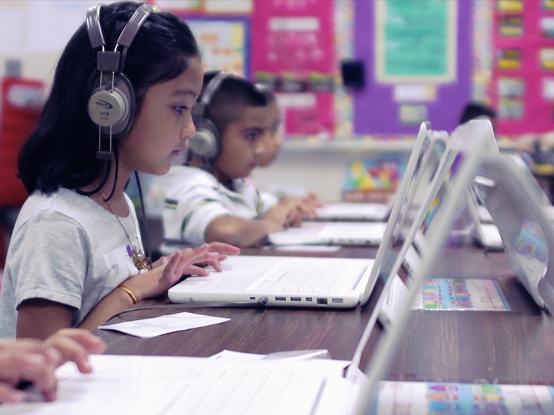 Students using Istation on a Laptop
