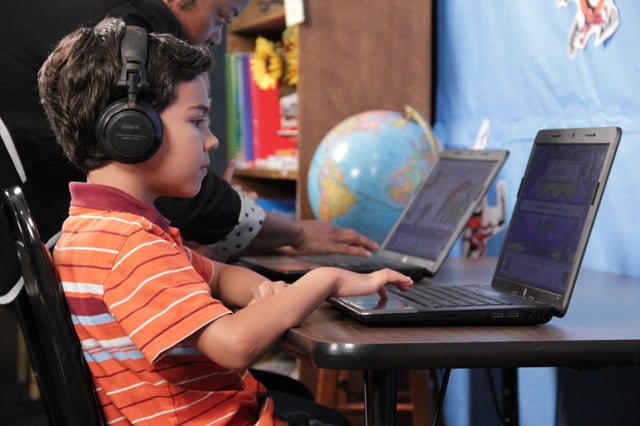 Students using Istation Reading