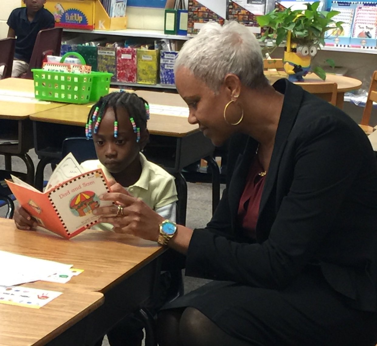 Teacher works one on one with student