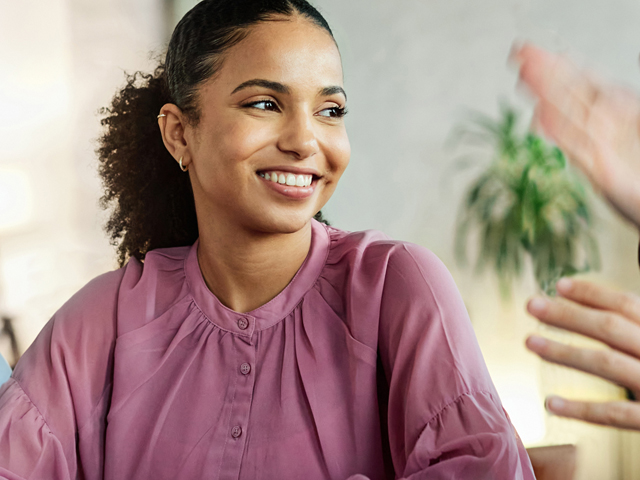 640x480 Educator - woman in group in pink shirt